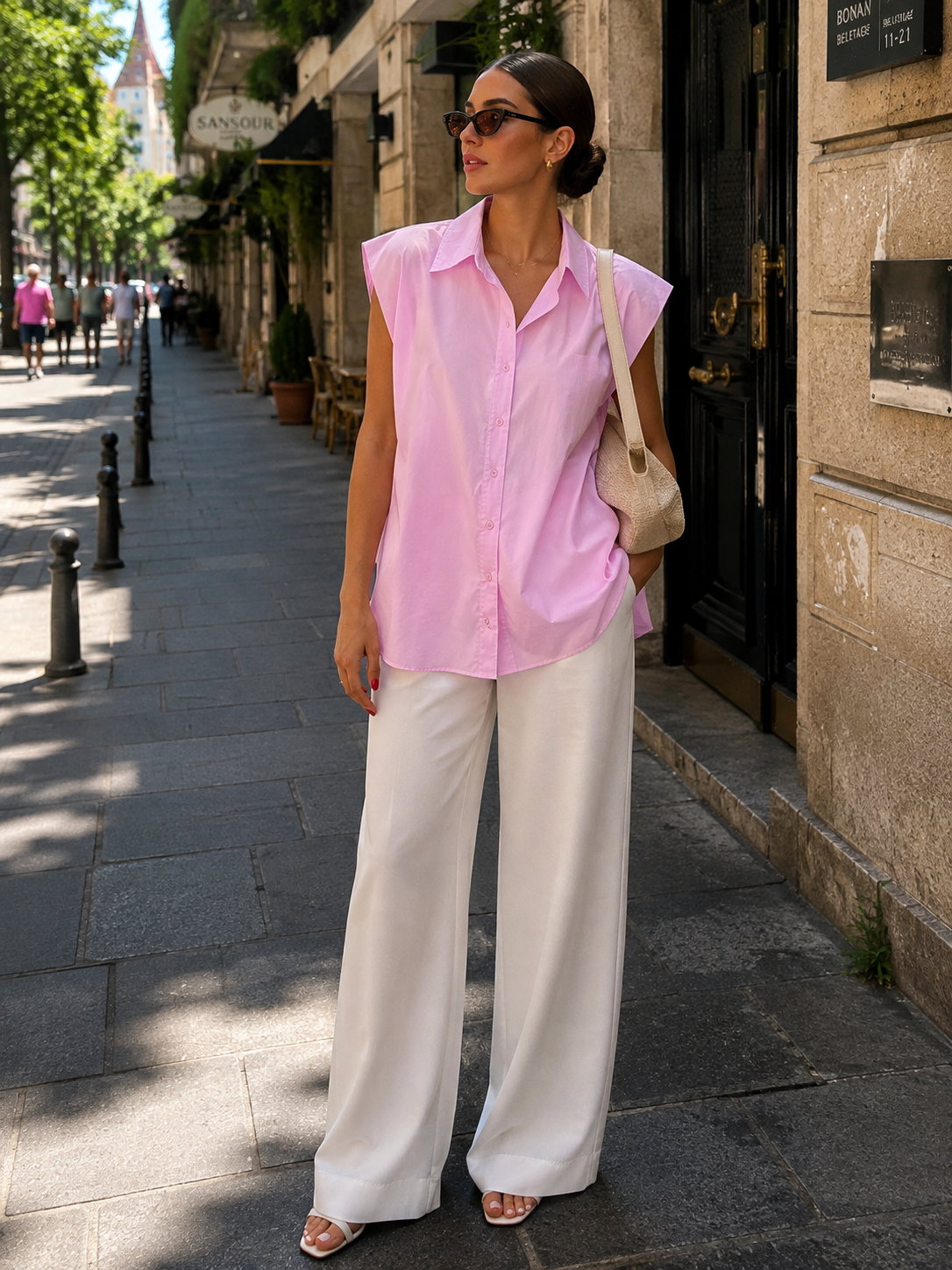 Pink sleeveless collared blouse